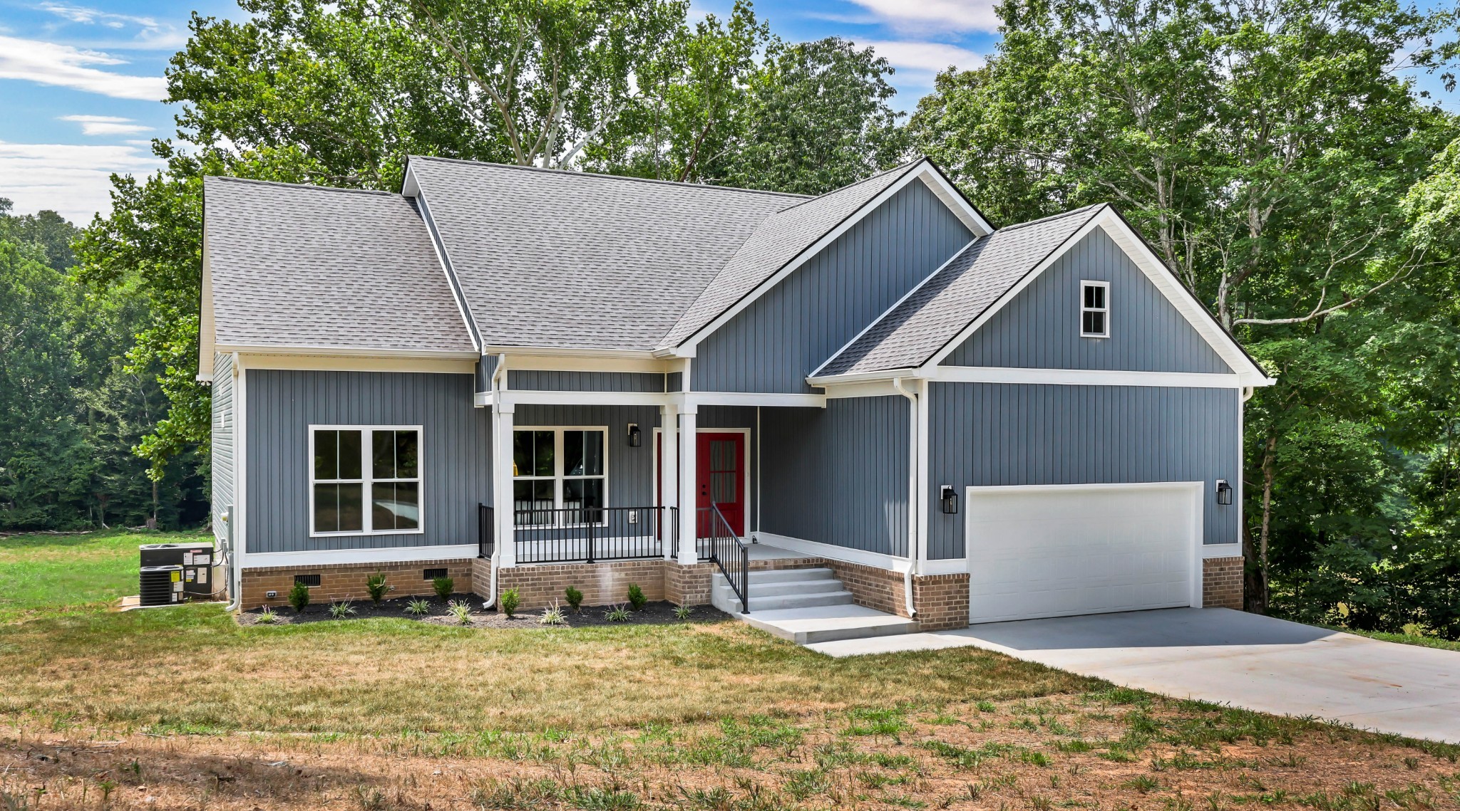 5570 Chambers Road Cumberland Furnace, TN 37051 - Photo 2 of 55 a house with trees in the background