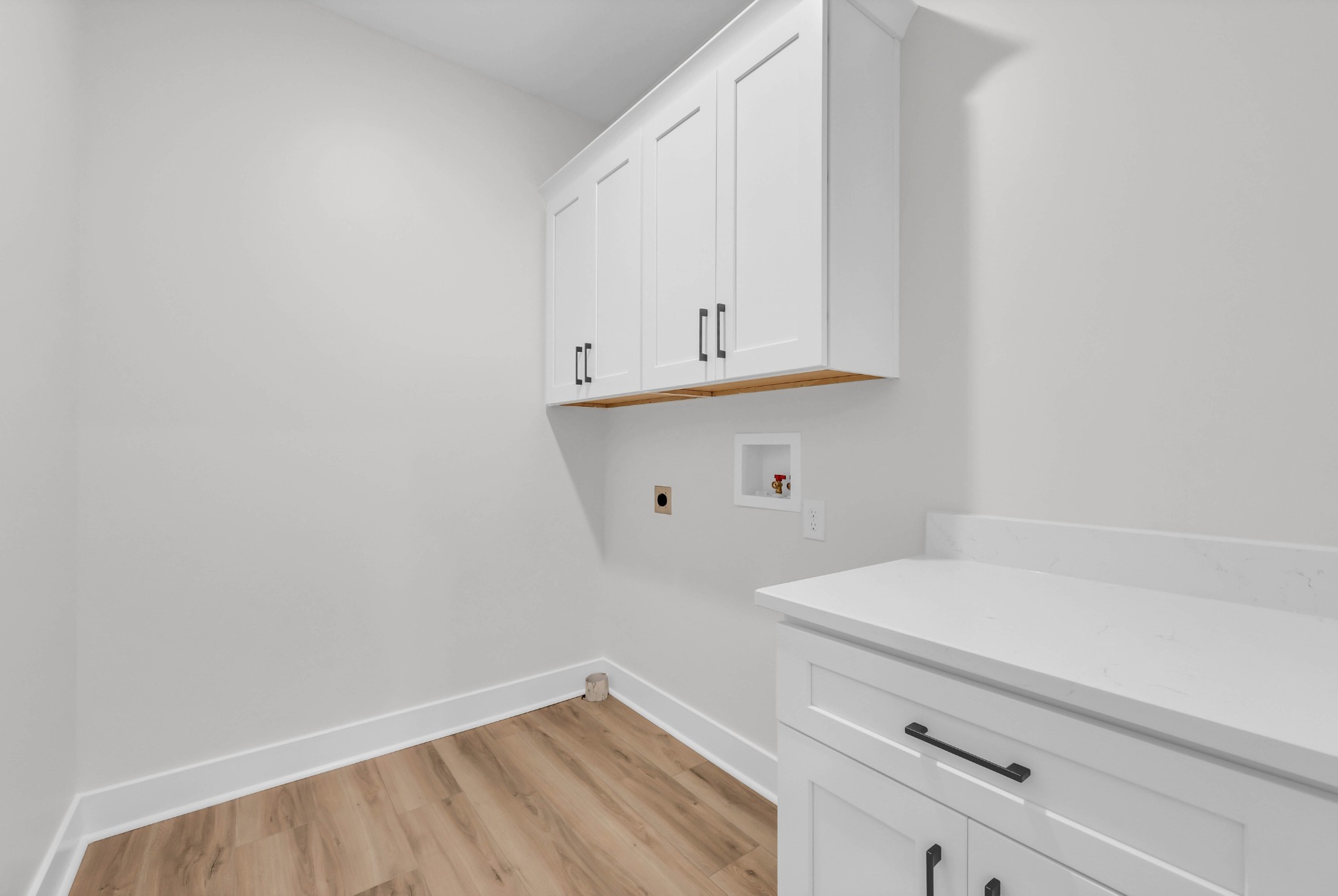 5570 Chambers Road Cumberland Furnace, TN 37051 - Photo 23 of 55 a view of storage and utility room with wooden floor