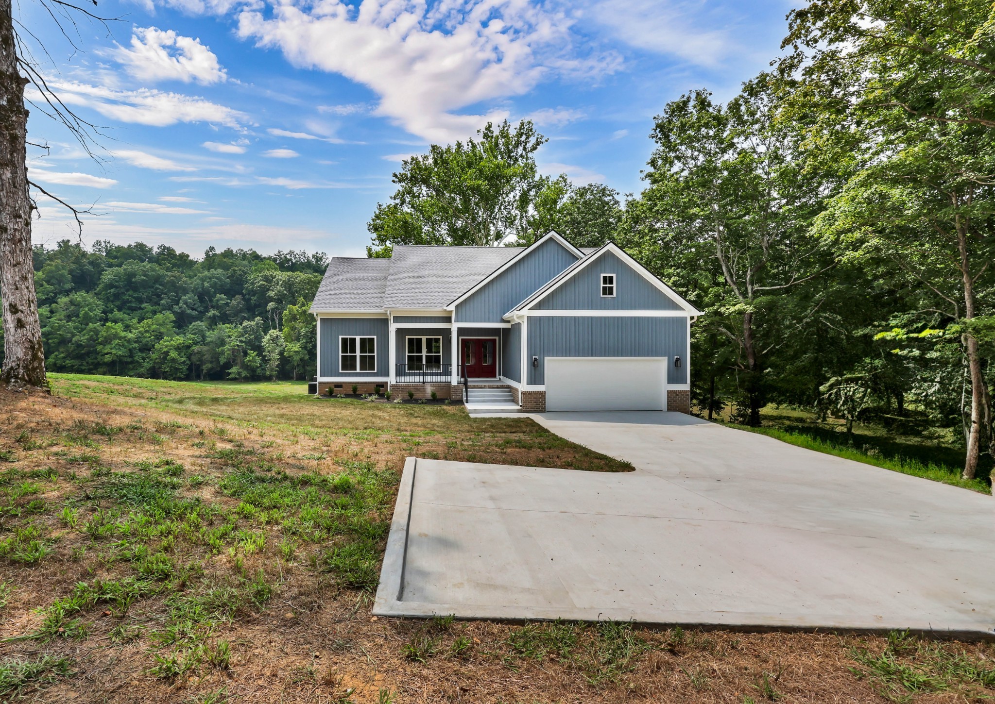 5570 Chambers Road Cumberland Furnace, TN 37051 - Photo 3 of 55 a front view of house with yard and green space