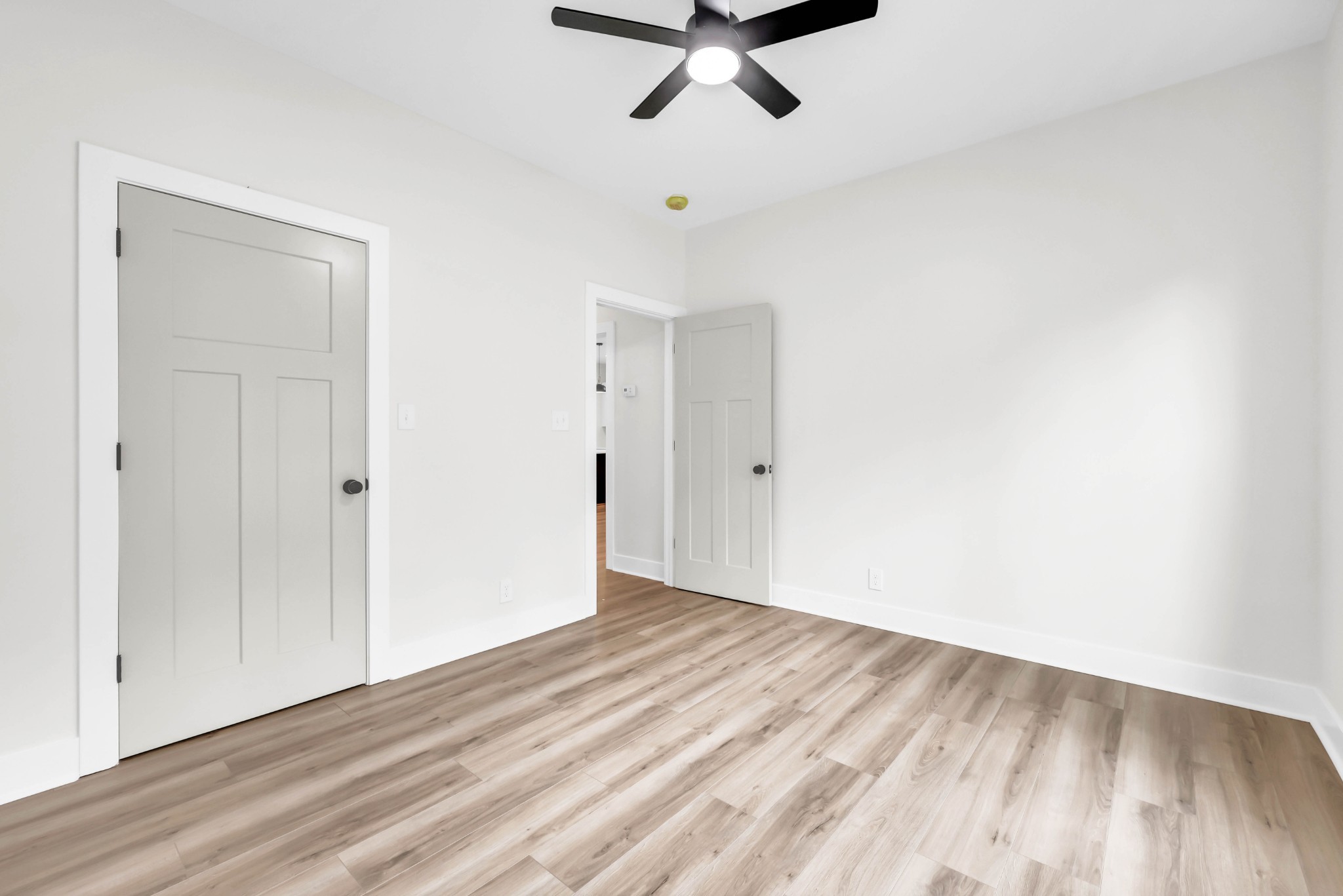 5570 Chambers Road Cumberland Furnace, TN 37051 - Photo 31 of 55 a view of a room with wooden floor and white walls