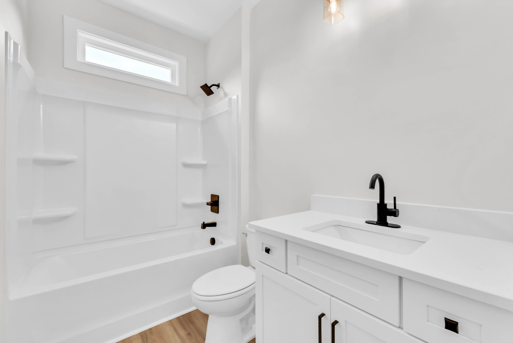 5570 Chambers Road Cumberland Furnace, TN 37051 - Photo 32 of 55 a bathroom with a sink a toilet and bathtub