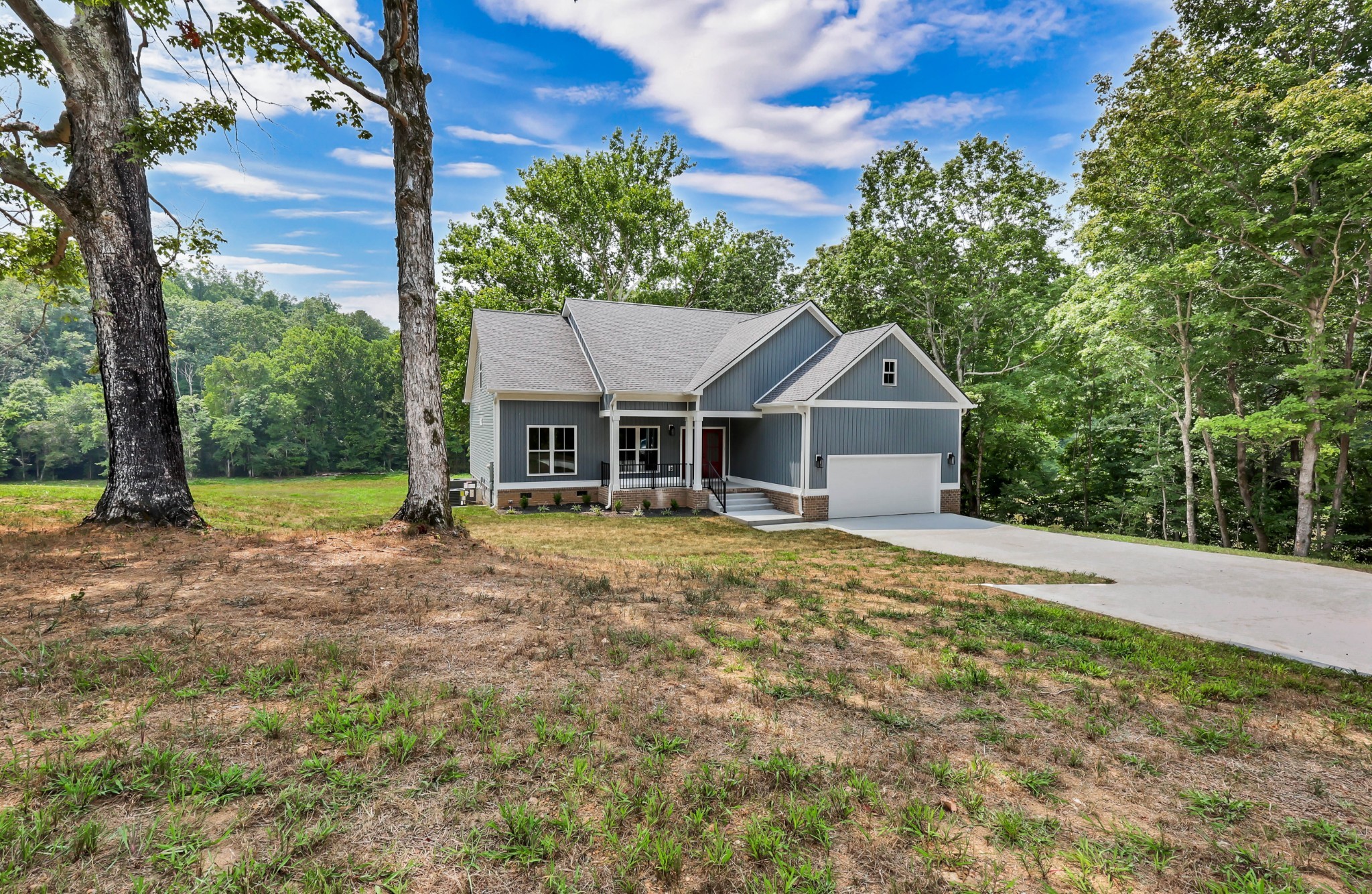 5570 Chambers Road Cumberland Furnace, TN 37051 - Photo 4 of 55 front view of a house with a yard