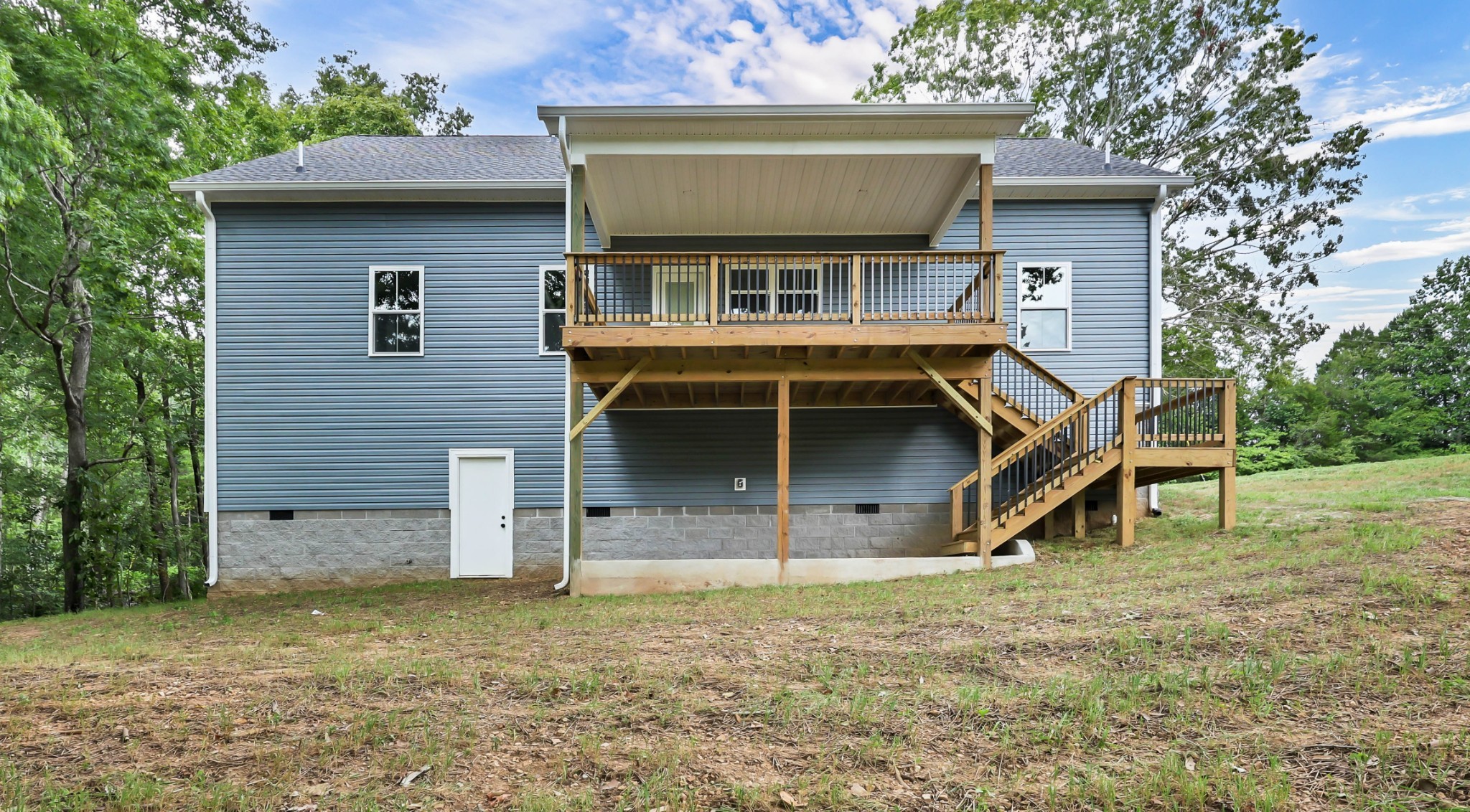 5570 Chambers Road Cumberland Furnace, TN 37051 - Photo 46 of 55 a front view of a house with a yard