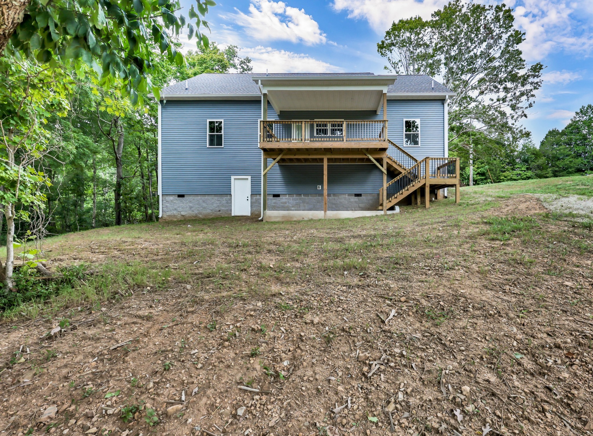 5570 Chambers Road Cumberland Furnace, TN 37051 - Photo 47 of 55 a view of a house with a yard