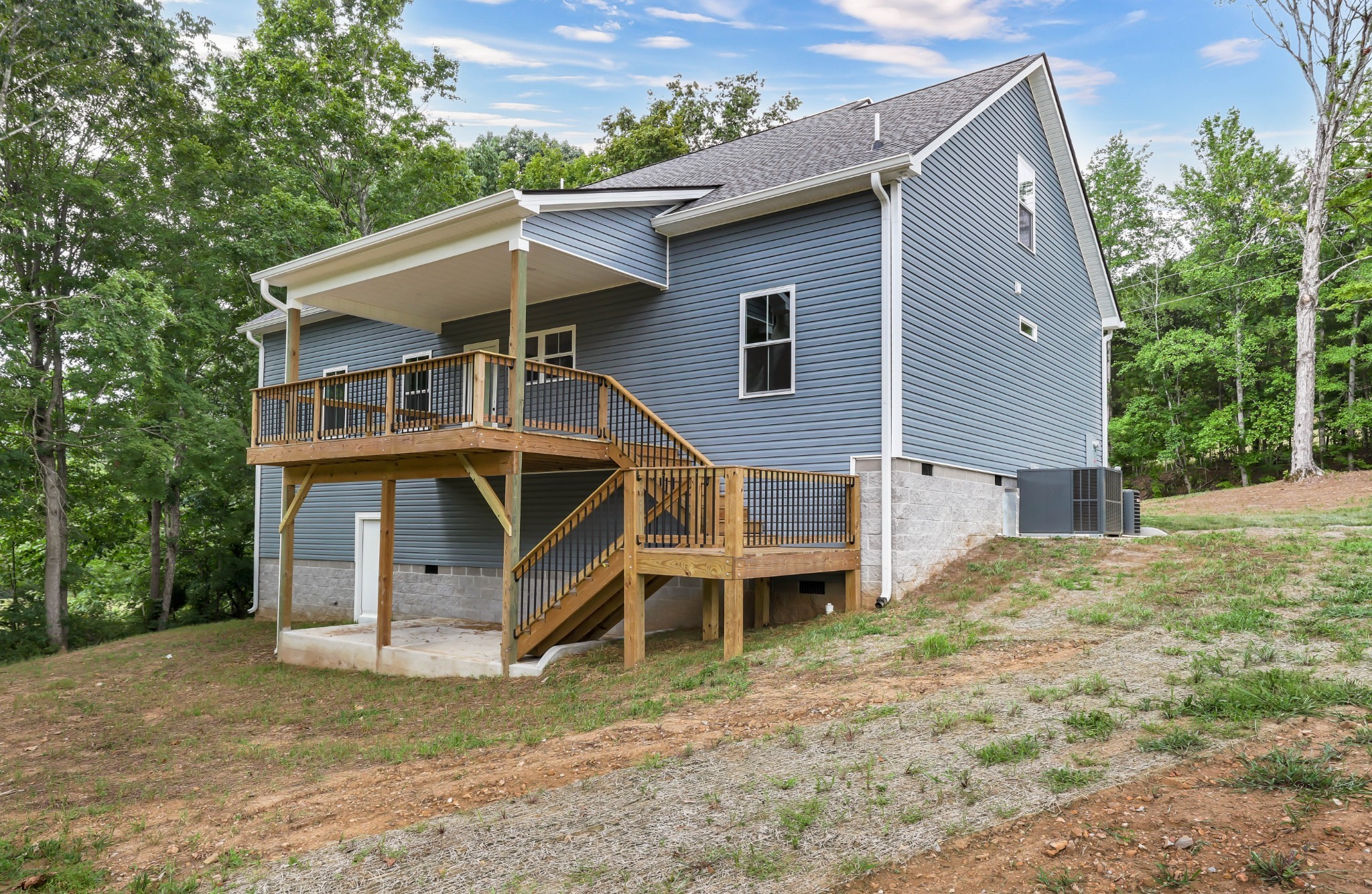 5570 Chambers Road Cumberland Furnace, TN 37051 - Photo 48 of 55 a view of a house with a yard