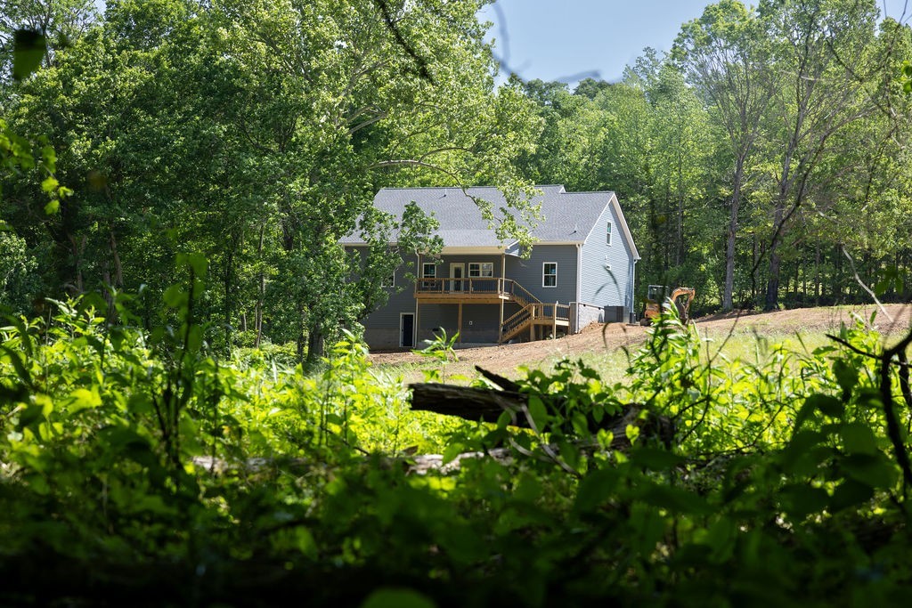 5570 Chambers Road Cumberland Furnace, TN 37051 - Photo 51 of 55 front view of a house with a yard