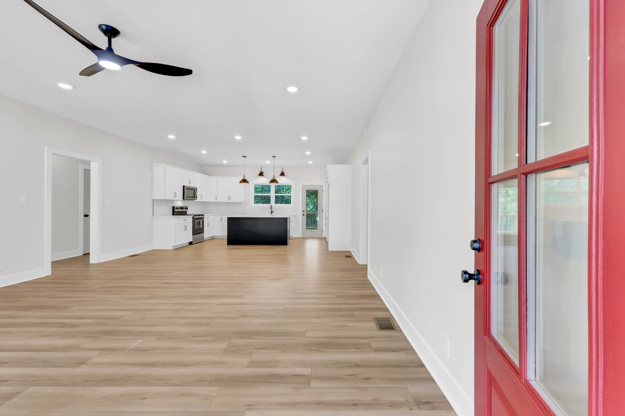 5570 Chambers Road Cumberland Furnace, TN 37051 - Photo 7 of 55 a view of kitchen and hall with wooden floor