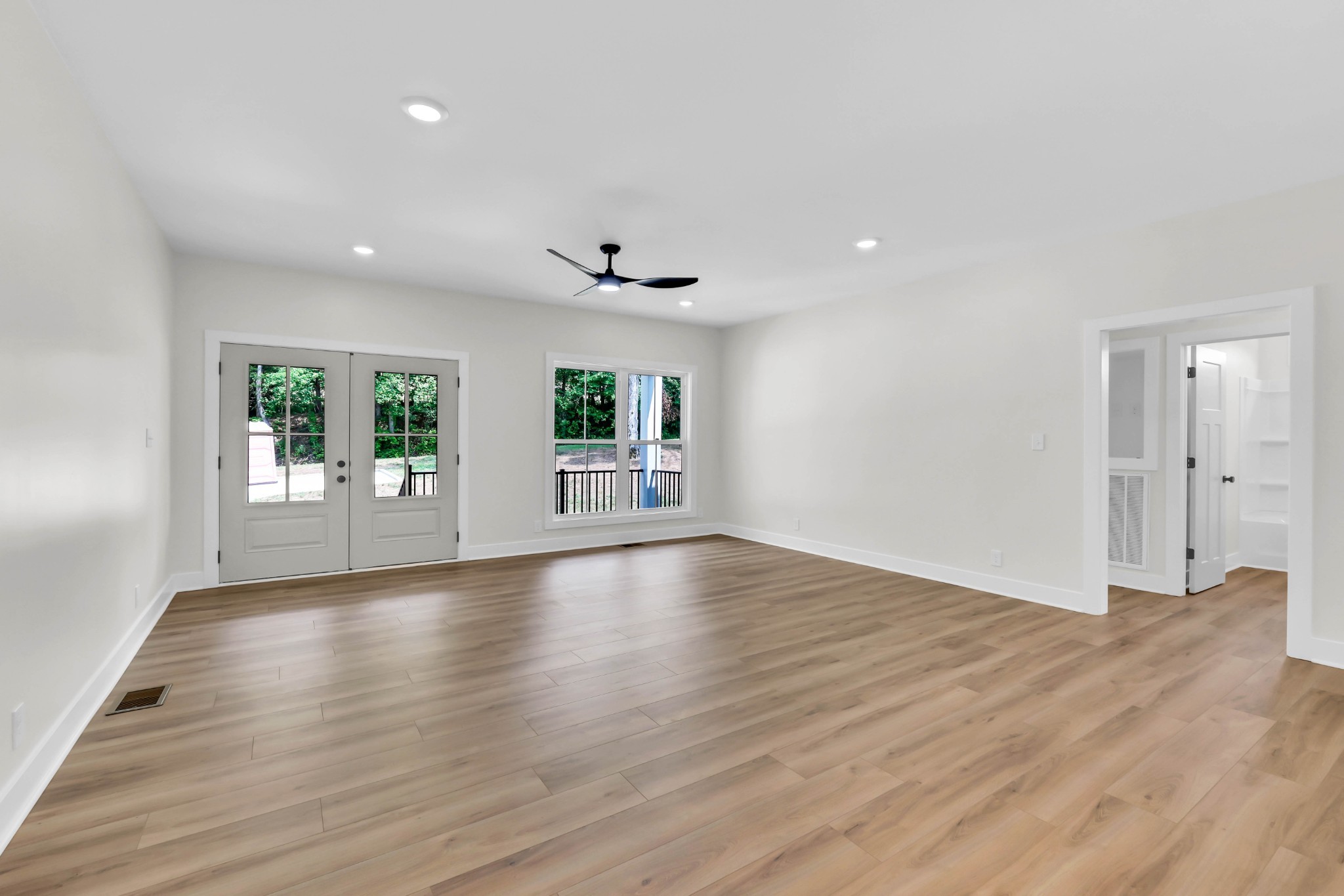 5570 Chambers Road Cumberland Furnace, TN 37051 - Photo 10 of 55 a view of an empty room with window and wooden floor