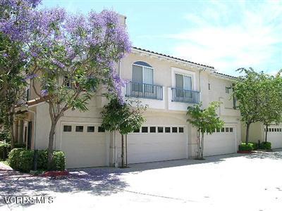 11527 Treeview Court Moorpark, CA 93021 - Photo 1 of 3 a front view of a house with a yard and garage