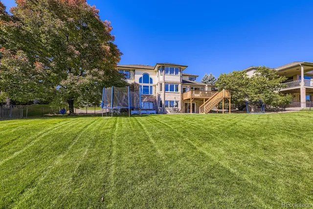 a view of a house with a big yard
