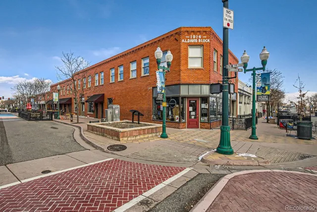 a view of a building with a tree