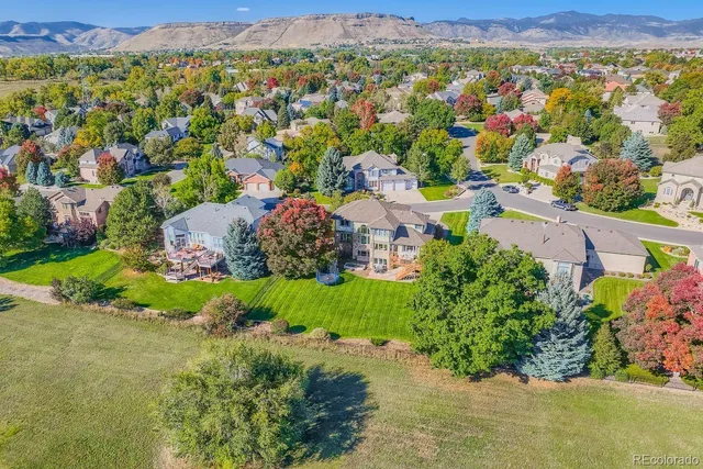 an aerial view of a city with lots of residential buildings