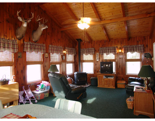 50 Gilson Road Littleton, MA 01460 - Photo 7 of 10 a living room filled with furniture