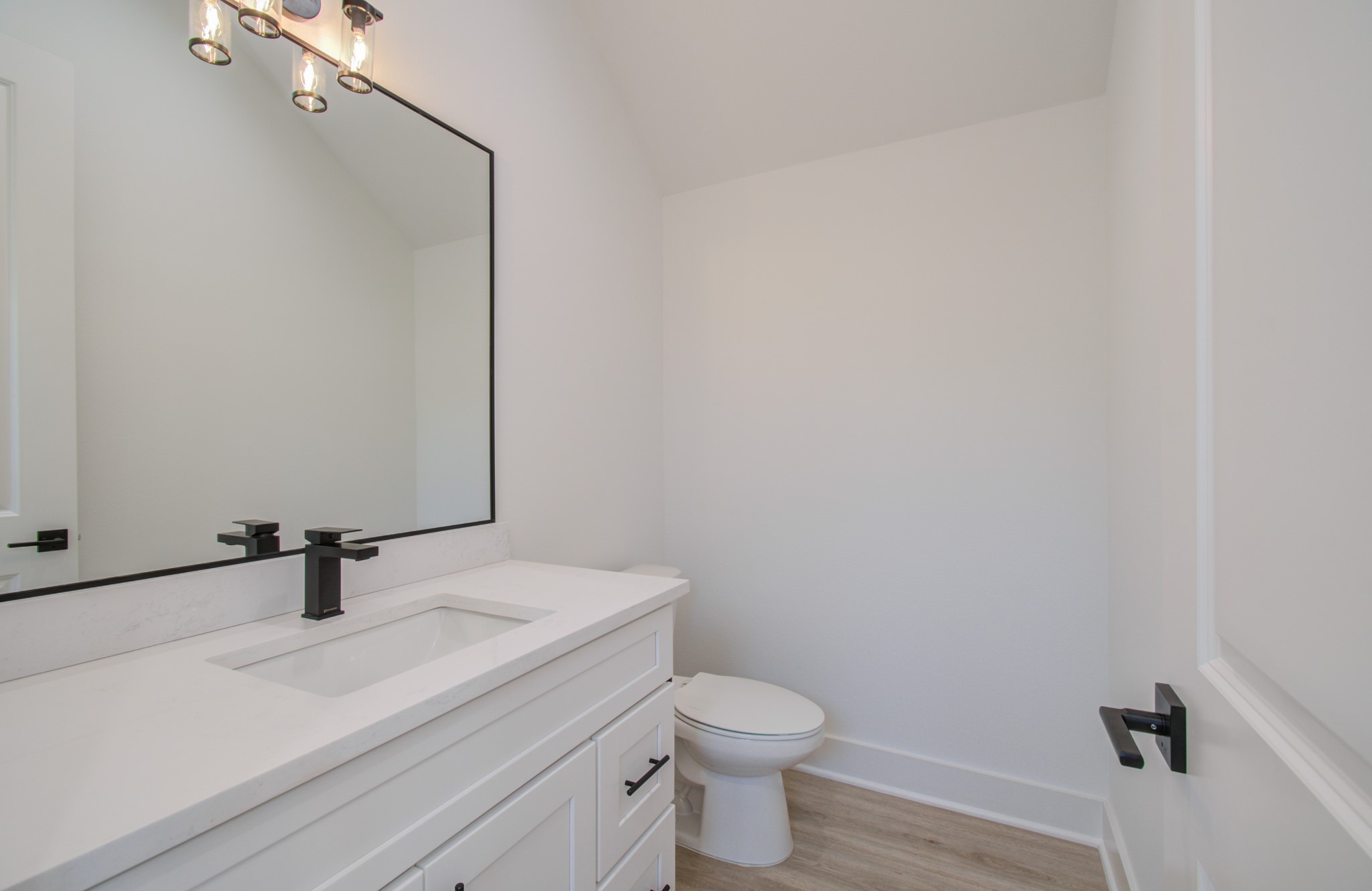 4425 Providence Street Houston, TX 77020 - Photo 15 of 40 a bathroom with a sink toilet and mirror