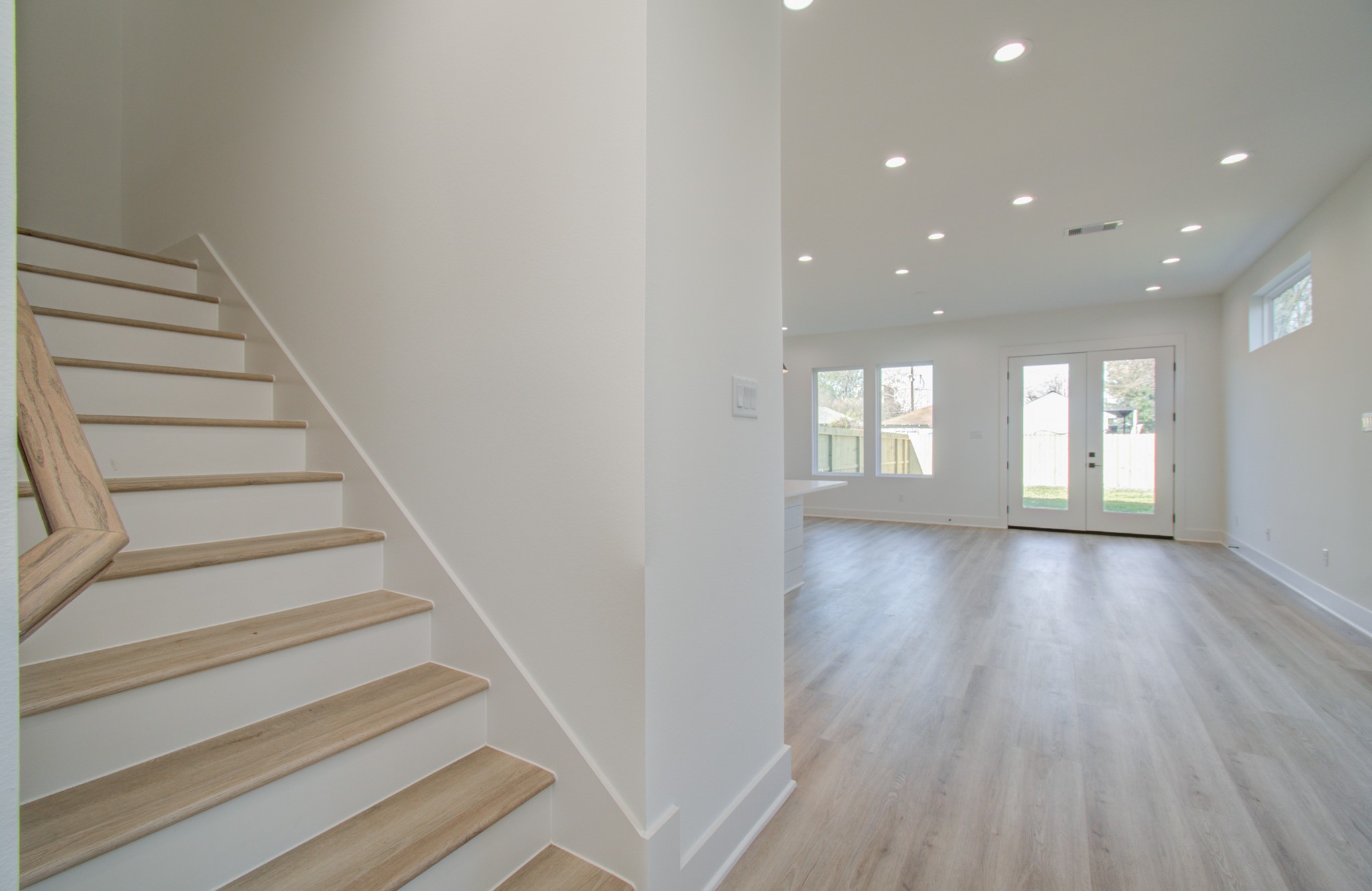 4425 Providence Street Houston, TX 77020 - Photo 16 of 40 a view of entryway and hall with wooden floor