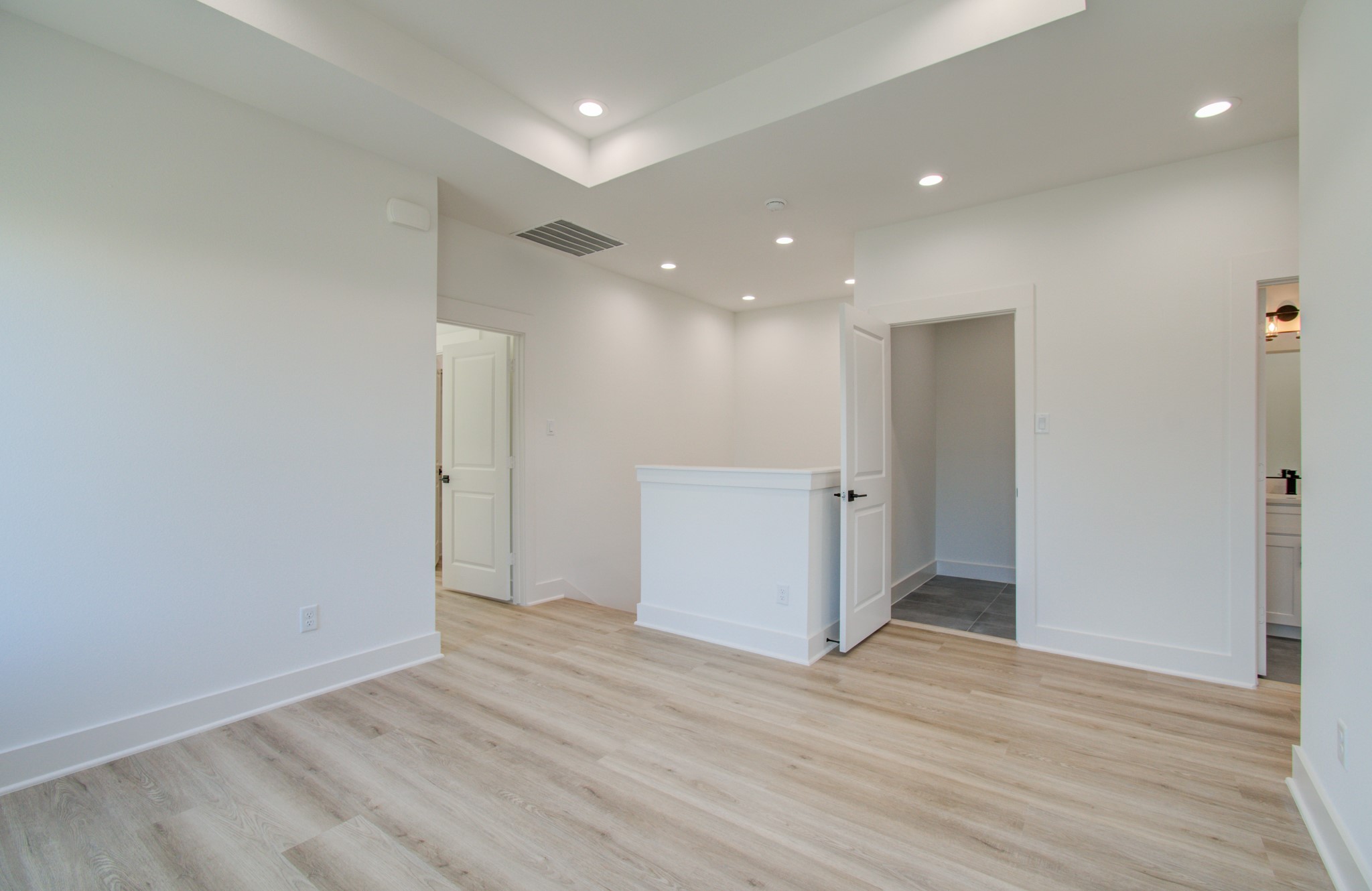 4425 Providence Street Houston, TX 77020 - Photo 18 of 40 a view of empty room with wooden floor