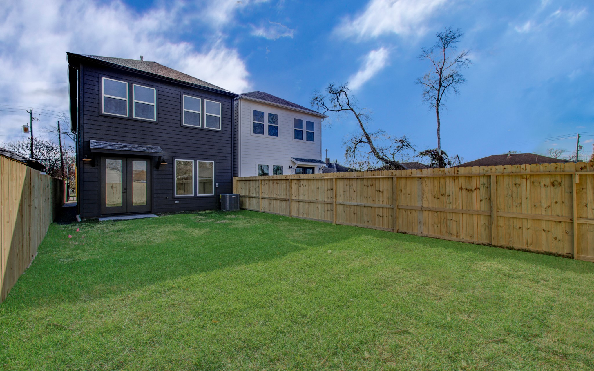 4425 Providence Street Houston, TX 77020 - Photo 36 of 40 a view of a house with a backyard