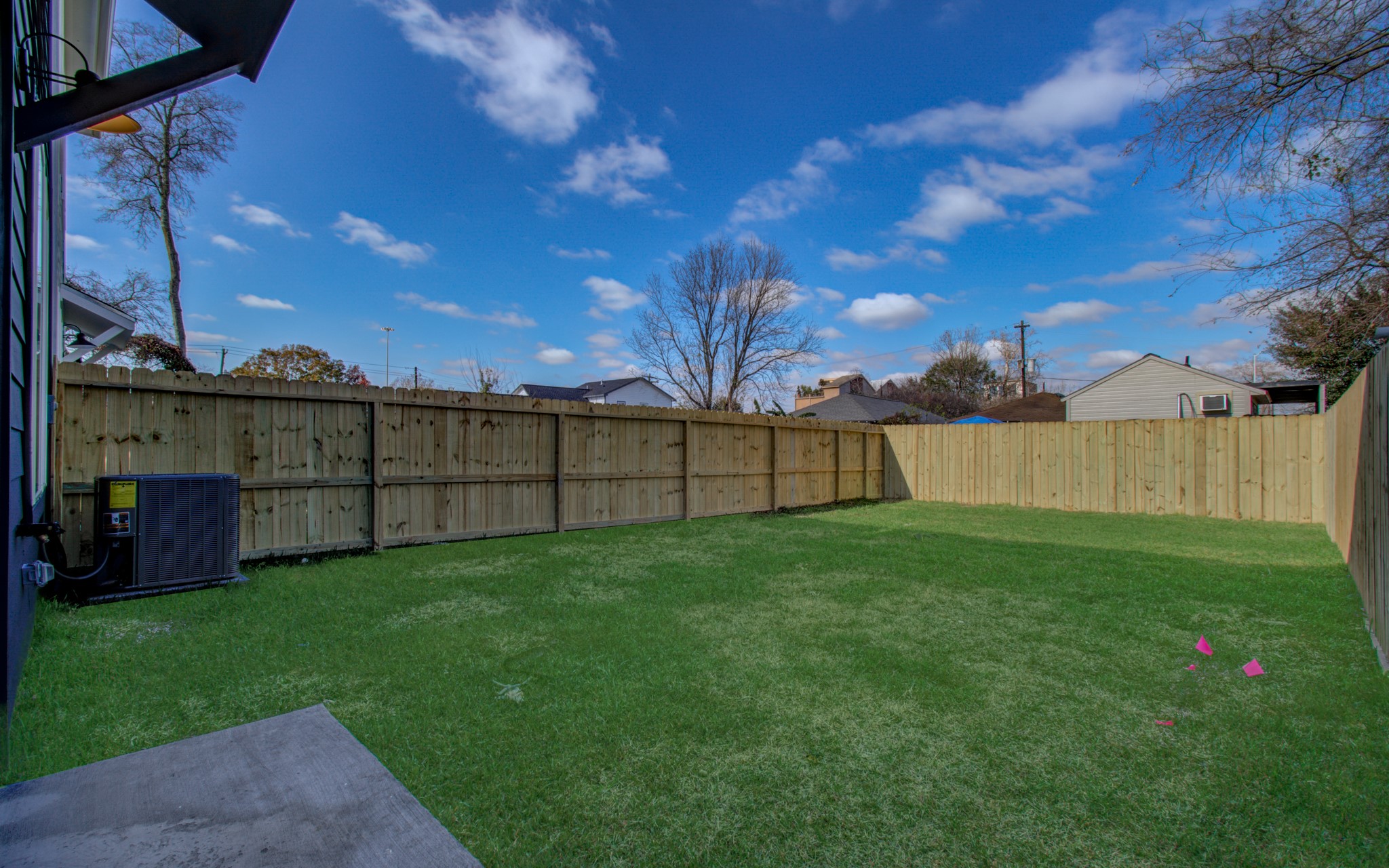 4425 Providence Street Houston, TX 77020 - Photo 37 of 40 a view of a backyard with wooden fence