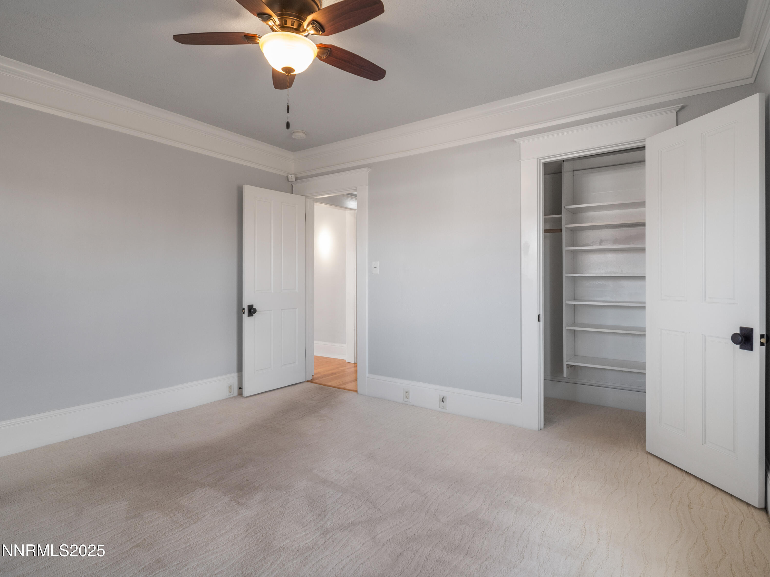 1297 Toler Avenue Gardnerville, NV 89410 - Photo 12 of 31 a view of an empty room and chandelier fan