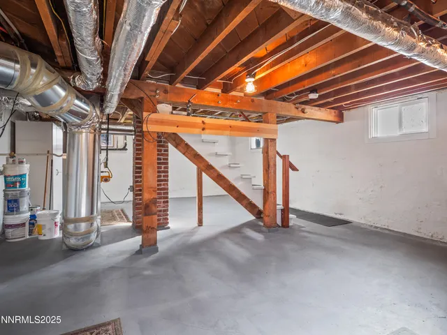 a view of an empty room with stairs