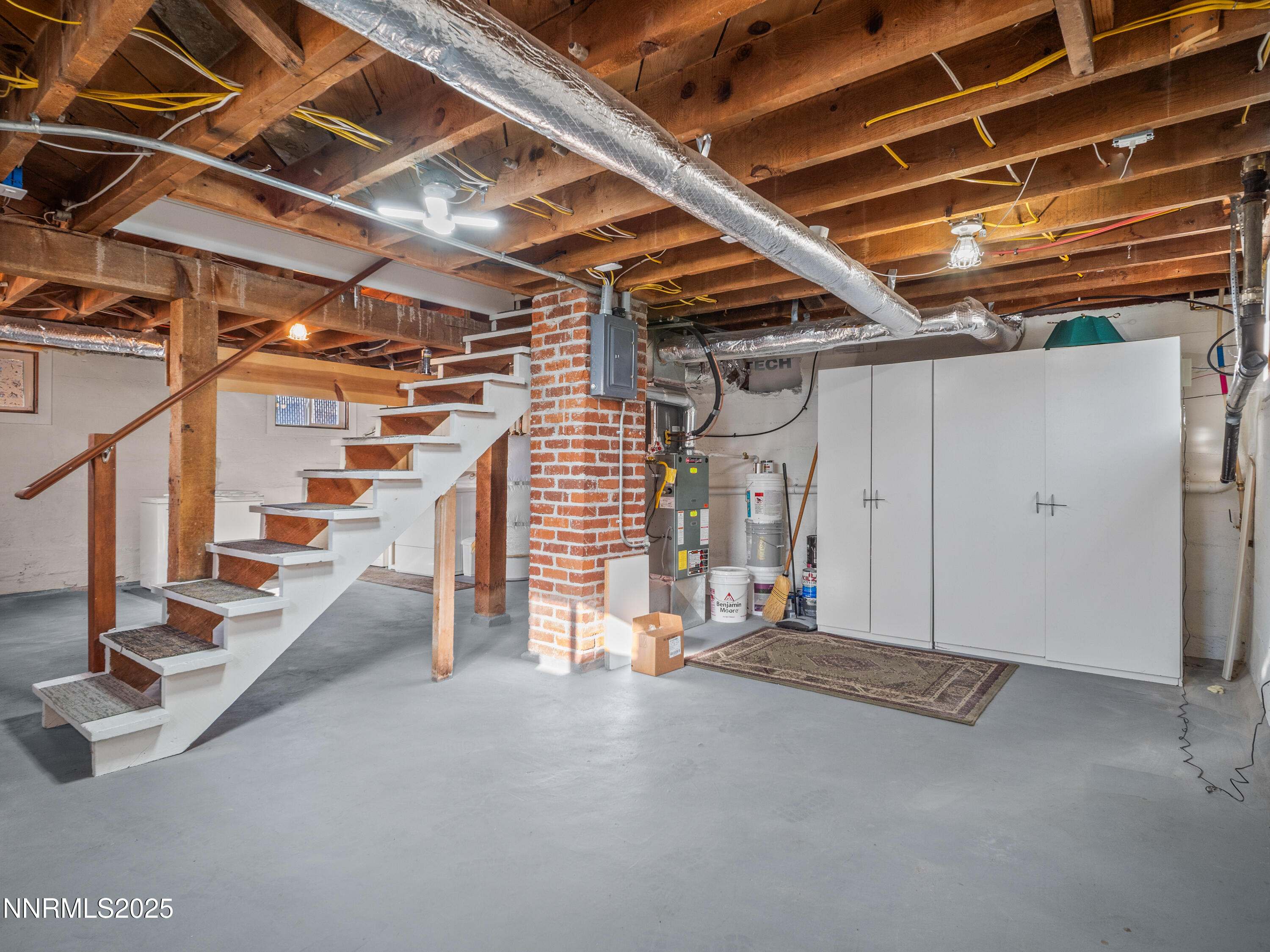 1297 Toler Avenue Gardnerville, NV 89410 - Photo 20 of 31 a view of an empty room with wooden floor