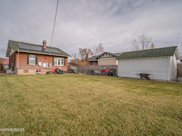 a front view of house with outdoor space