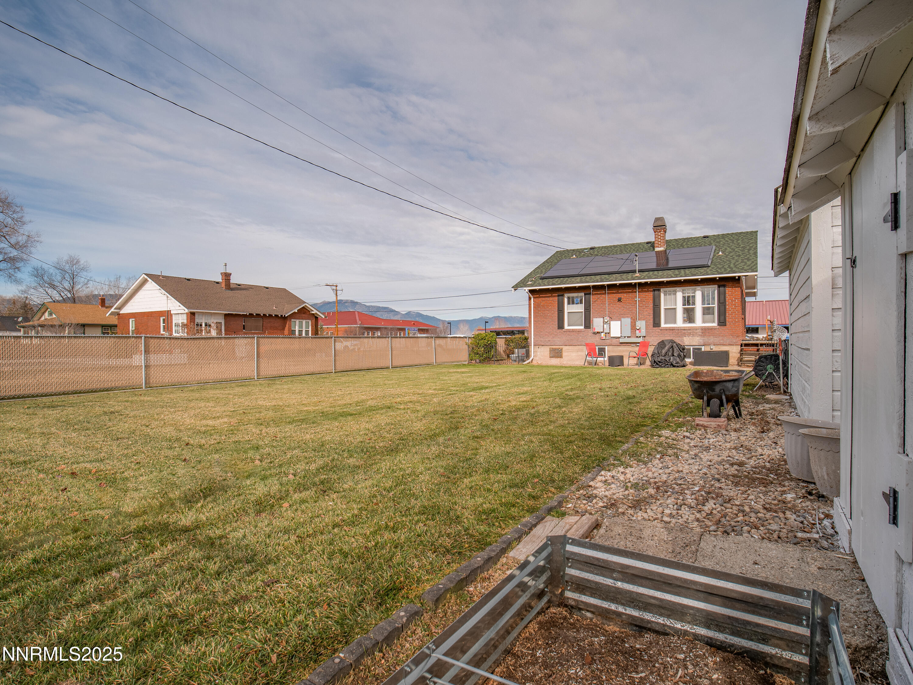 1297 Toler Avenue Gardnerville, NV 89410 - Photo 28 of 31 a view of a house with a yard