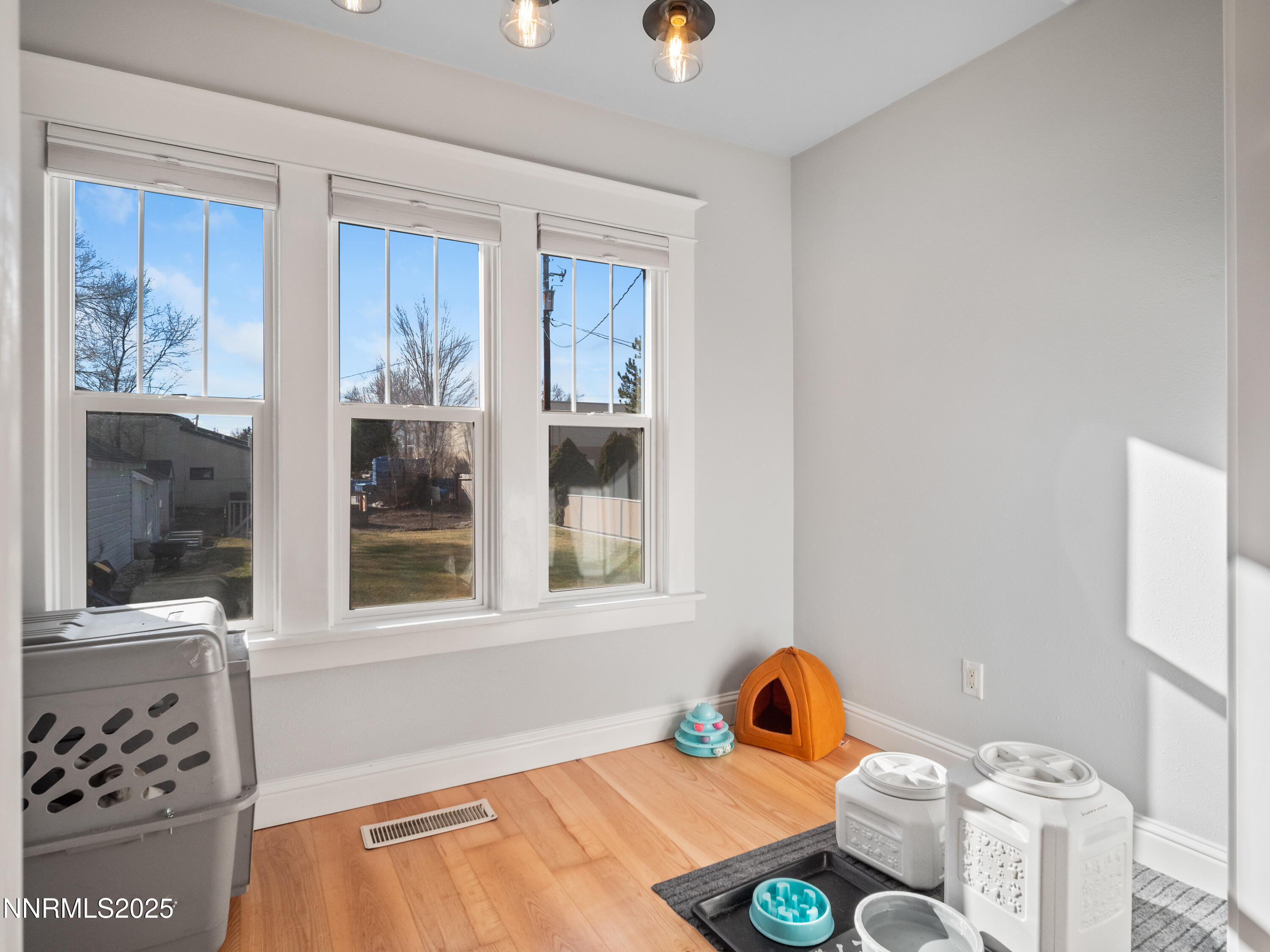 1297 Toler Avenue Gardnerville, NV 89410 - Photo 5 of 31 a bedroom with a bed and a window