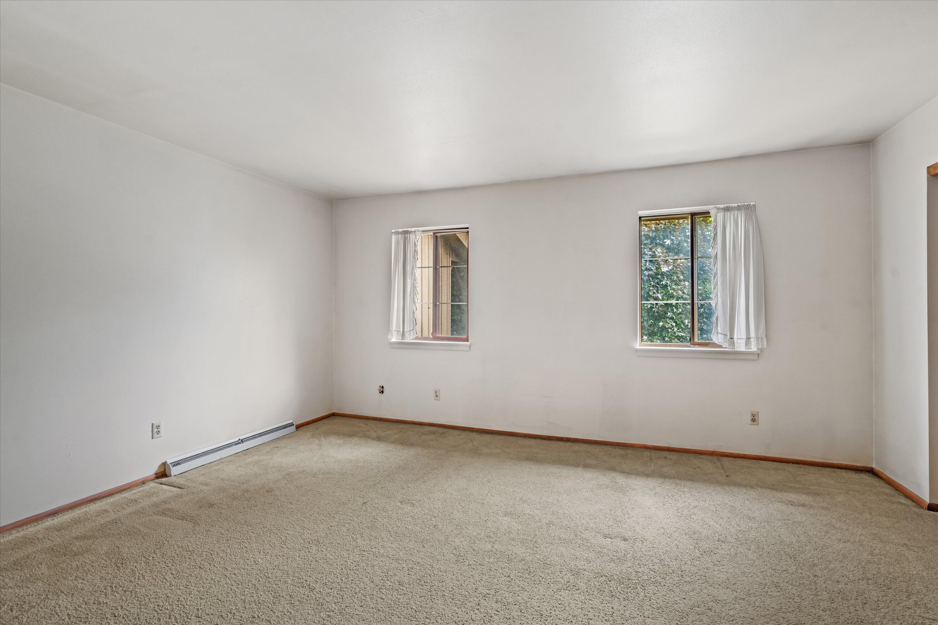 9903 Beloit Road, Unit F10 Milwaukee, WI 53227 - Photo 15 of 30 15-Primary Bedroom