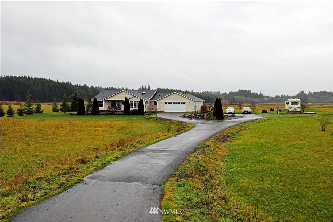 430 Bunker Creek Road Chehalis, WA 98532 - Photo 29 of 30 a view of a lake with houses