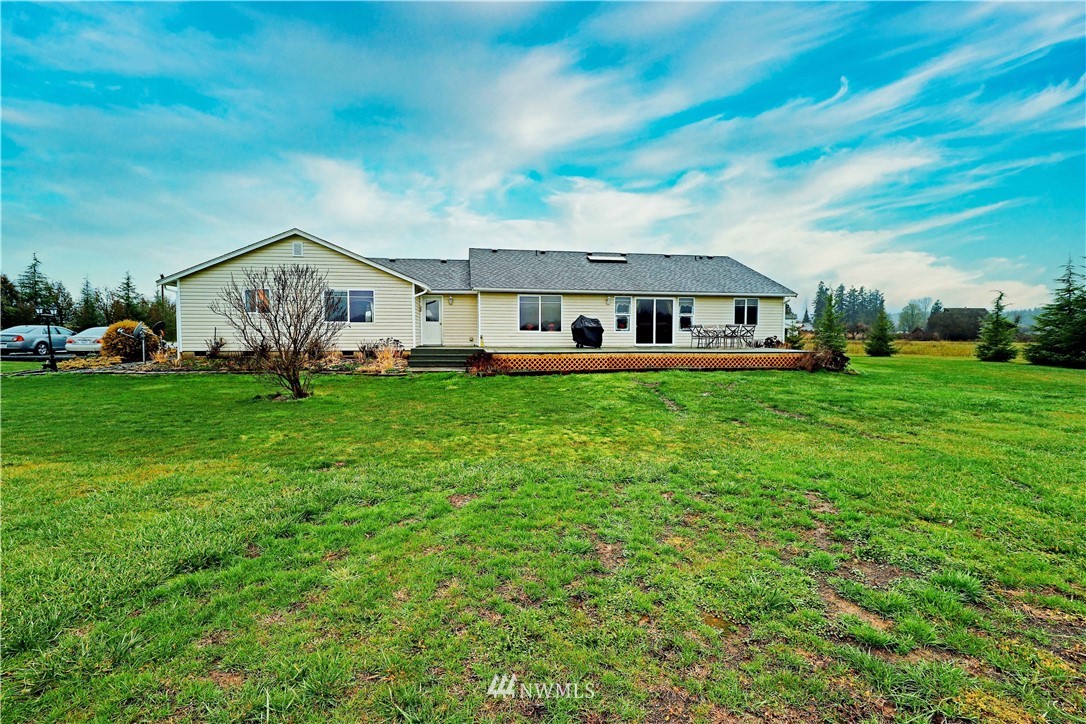 430 Bunker Creek Road Chehalis, WA 98532 - Photo 4 of 30 a view of a house with a big yard and large trees