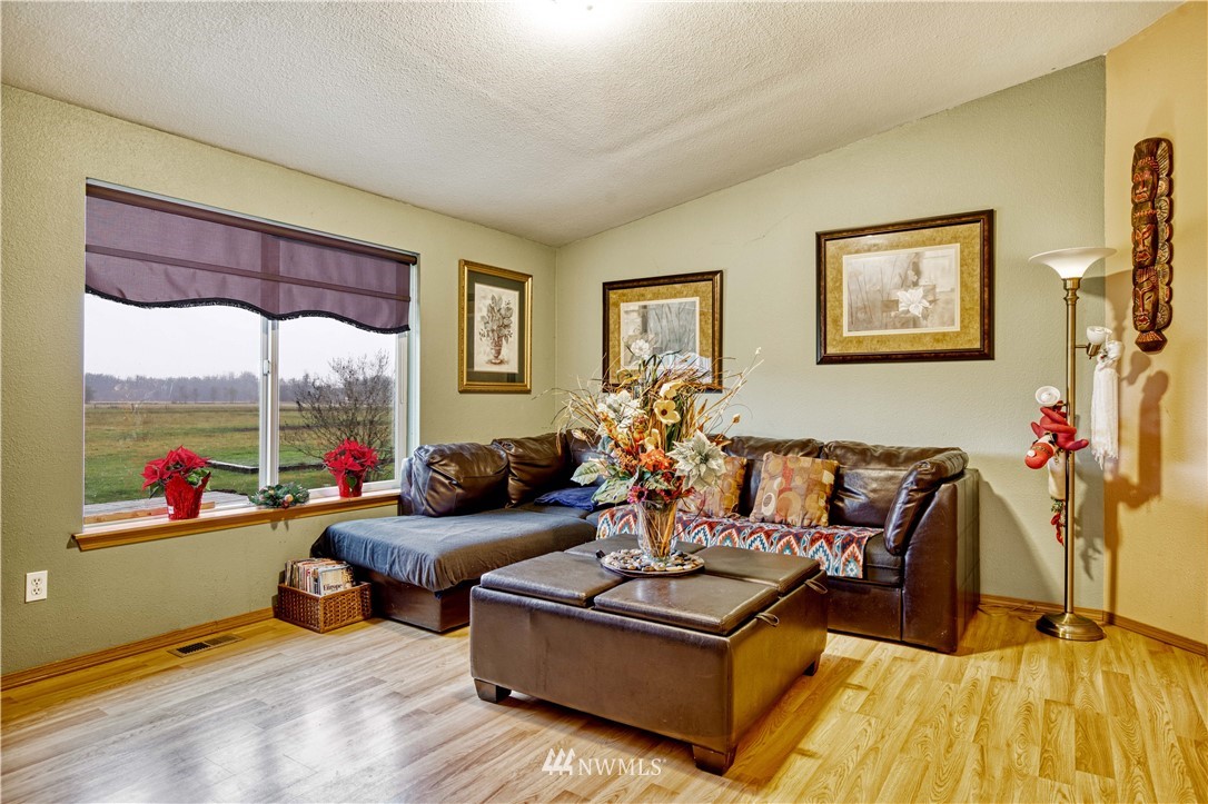 430 Bunker Creek Road Chehalis, WA 98532 - Photo 9 of 30 a living room with furniture and a large window