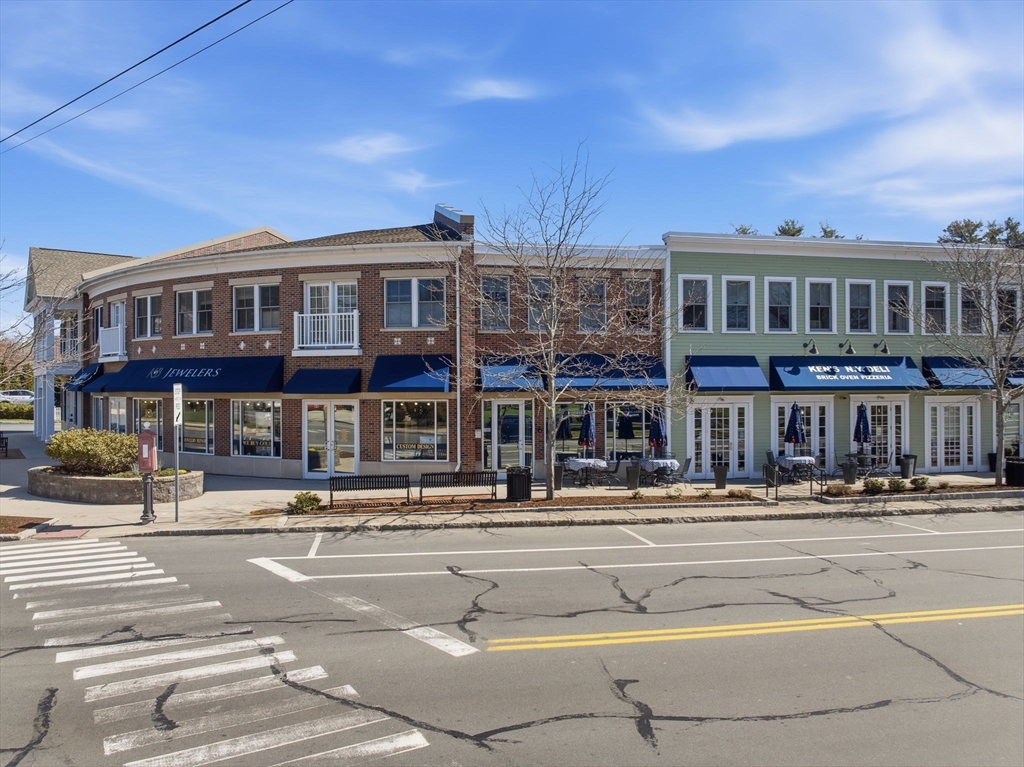 70 Great Road, Unit G Bedford, MA 01730 - Photo 14 of 15 a front view of a building with street view