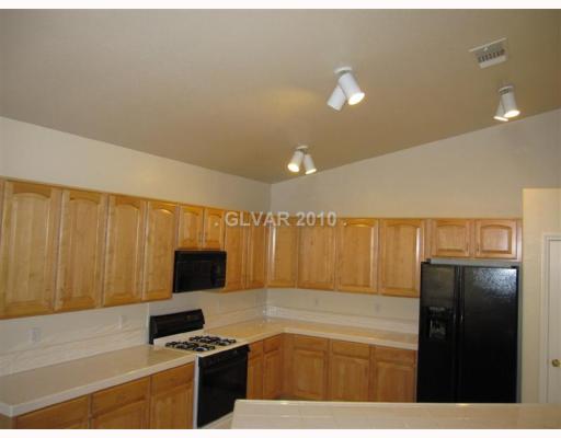 7932 Sky Ridge Road Las Vegas, NV 89128 - Photo 5 of 12 Kitchen.
