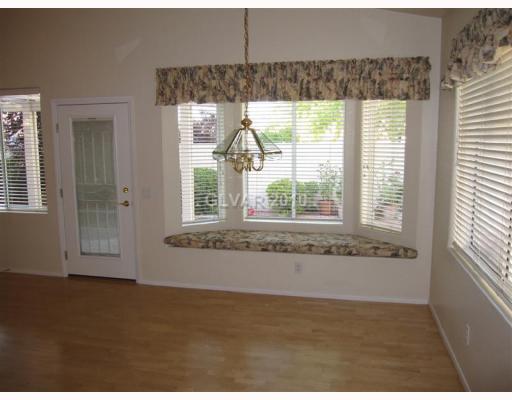 7932 Sky Ridge Road Las Vegas, NV 89128 - Photo 9 of 12 Dining Room.