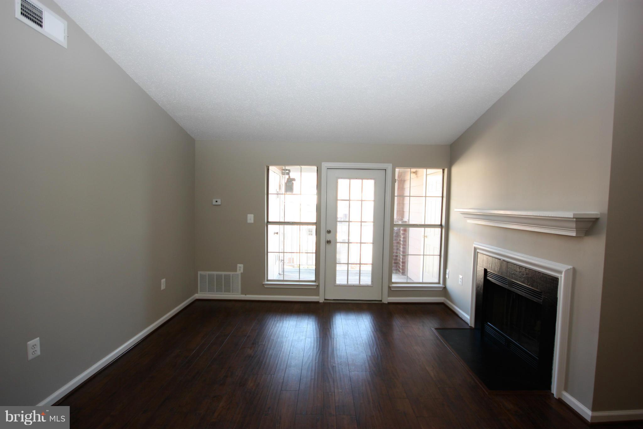 20979 Timber Ridge Terrace, Unit 302 Ashburn, VA 20147 - Photo 5 of 16 Family Room