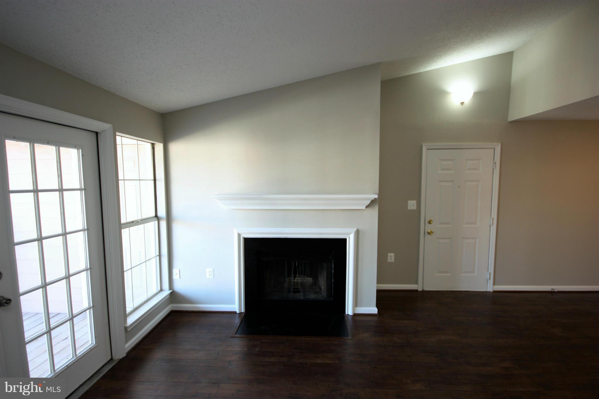 20979 Timber Ridge Terrace, Unit 302 Ashburn, VA 20147 - Photo 6 of 16 Wood Burning Fireplace