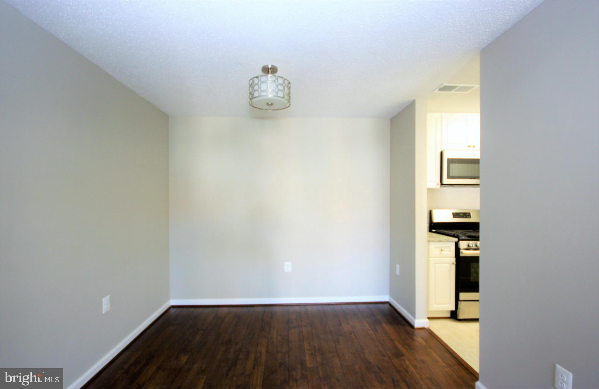 20979 Timber Ridge Terrace, Unit 302 Ashburn, VA 20147 - Photo 8 of 16 Dining Room