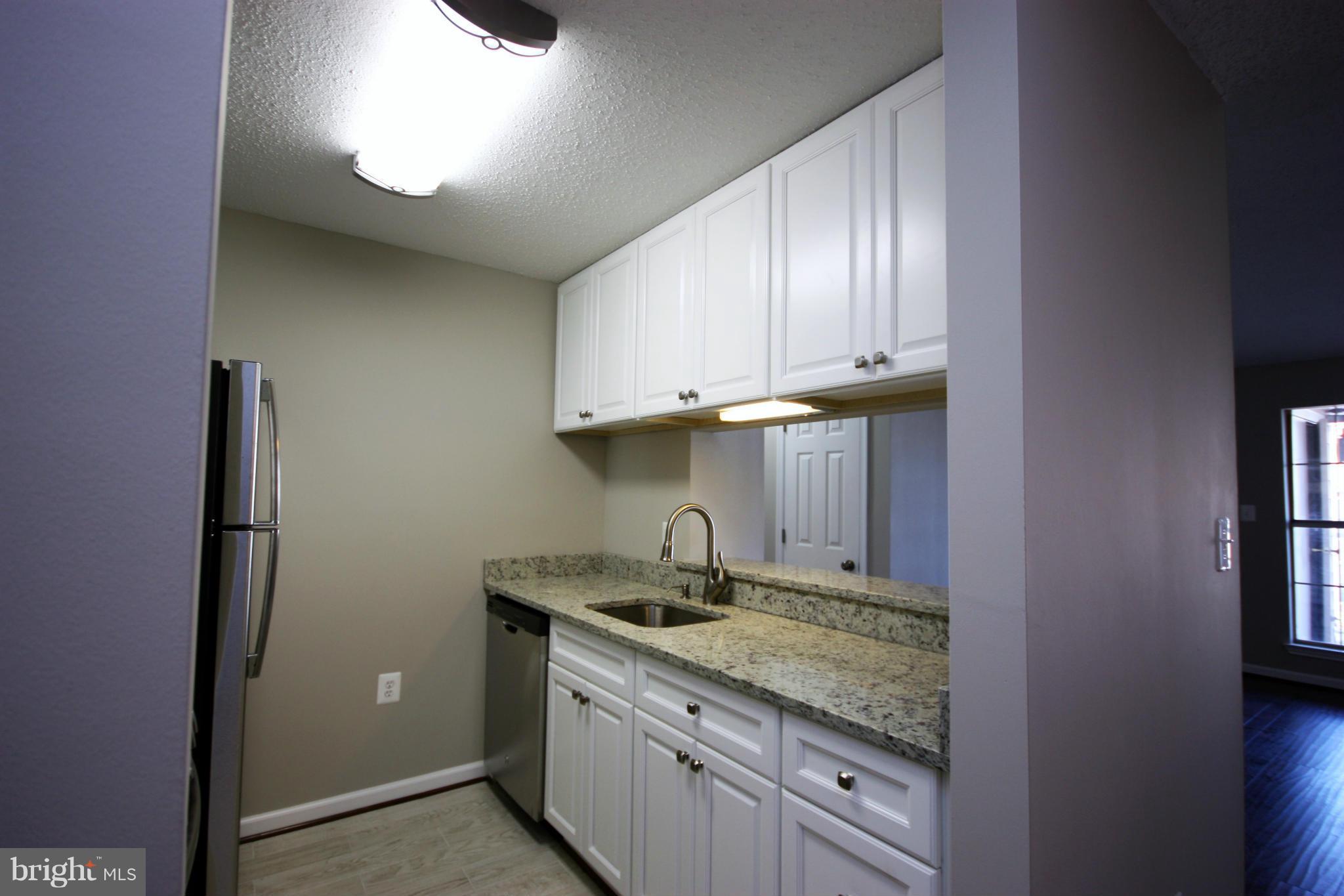 20979 Timber Ridge Terrace, Unit 302 Ashburn, VA 20147 - Photo 10 of 16 Kitchen