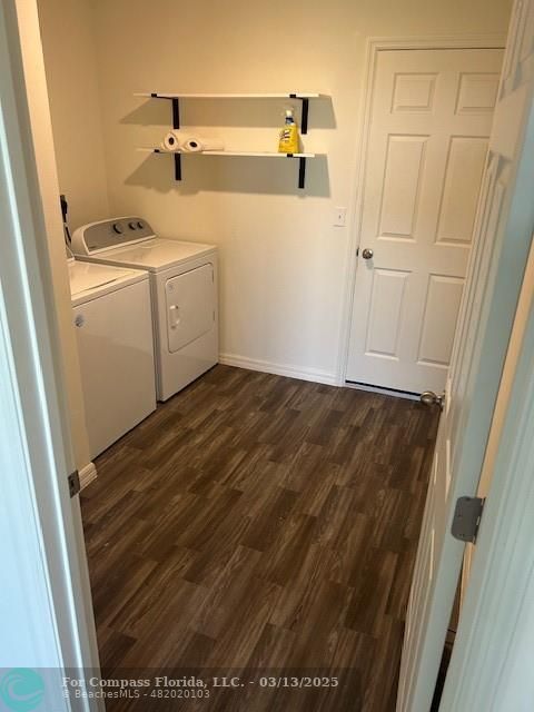 787 Southeast 25th Drive Okeechobee, FL 34974 - Photo 11 of 18 a utility room with dryer and washer