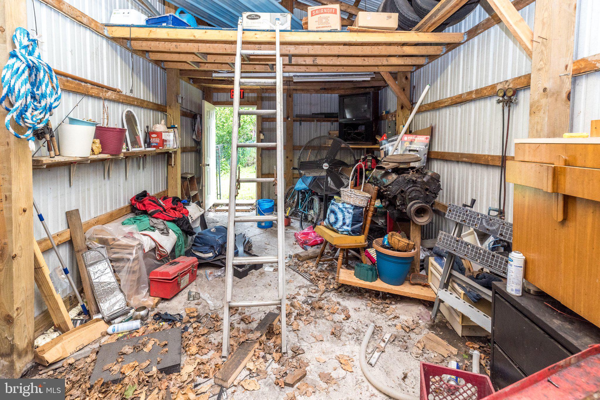 514 McKnight Street Gordon, PA 17921 - Photo 19 of 22 Cluttered shed brimming with potential.