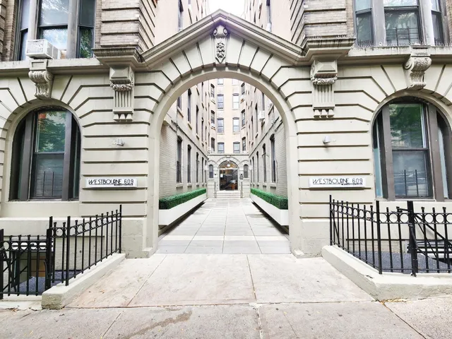 a bathroom with a sink a toilet and bathtub