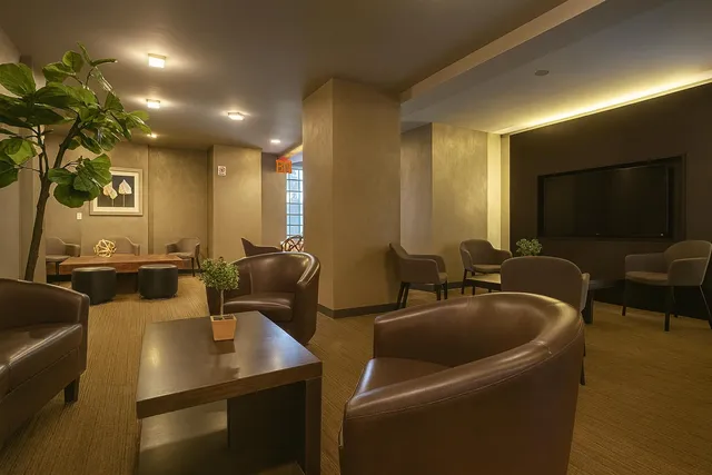 a workspace with furniture and window