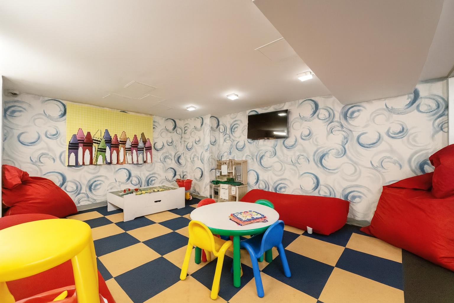 609 West 137th Street, Unit 26 Manhattan, NY 10031 - Photo 16 of 21 a living room with furniture and a black countertop with rug