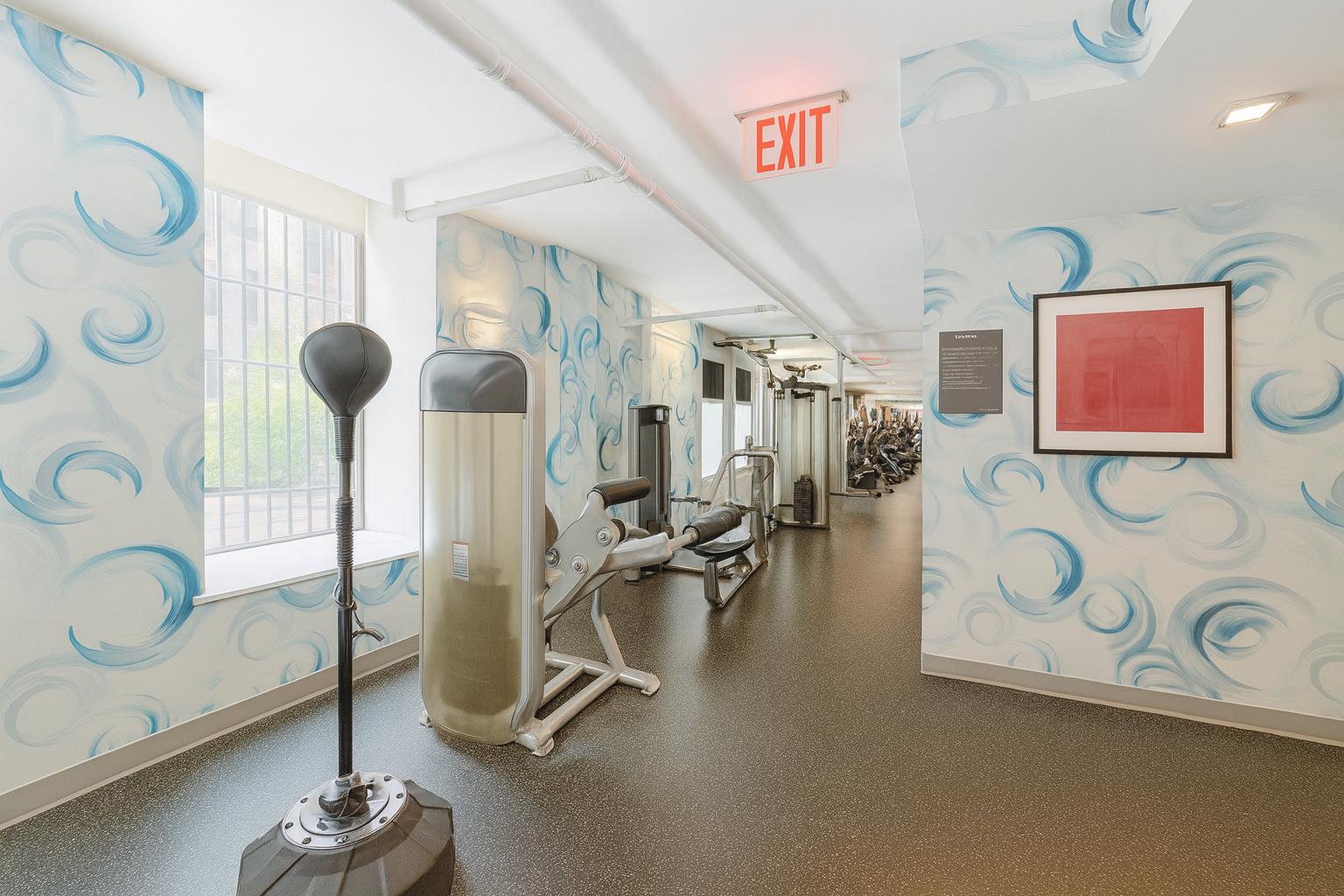 609 West 137th Street, Unit 26 Manhattan, NY 10031 - Photo 18 of 21 a view of a room with gym equipment