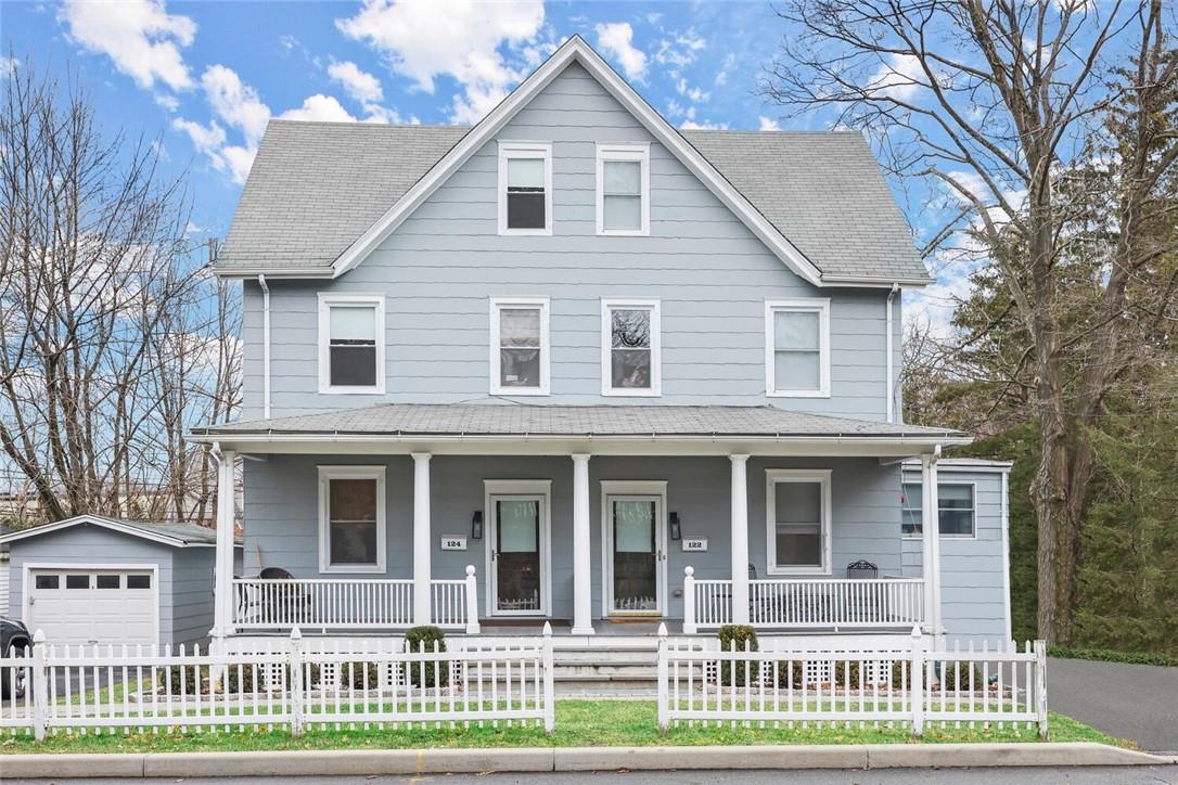 122 North Street Rye, NY 10580 - Photo 1 of 1 a view of a house with a yard and large trees