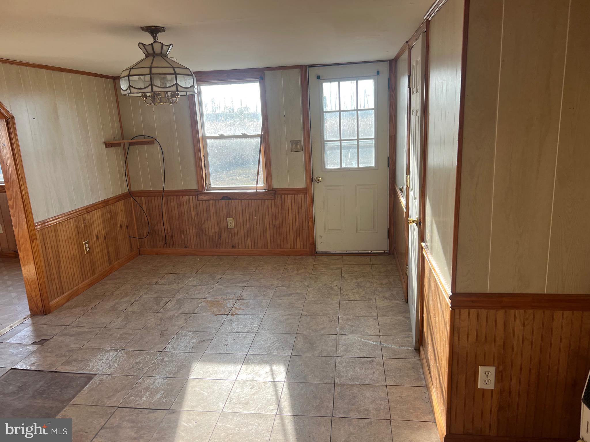 2736 Toddville Road Toddville, MD 21672 - Photo 20 of 44 a view of an empty room with a window