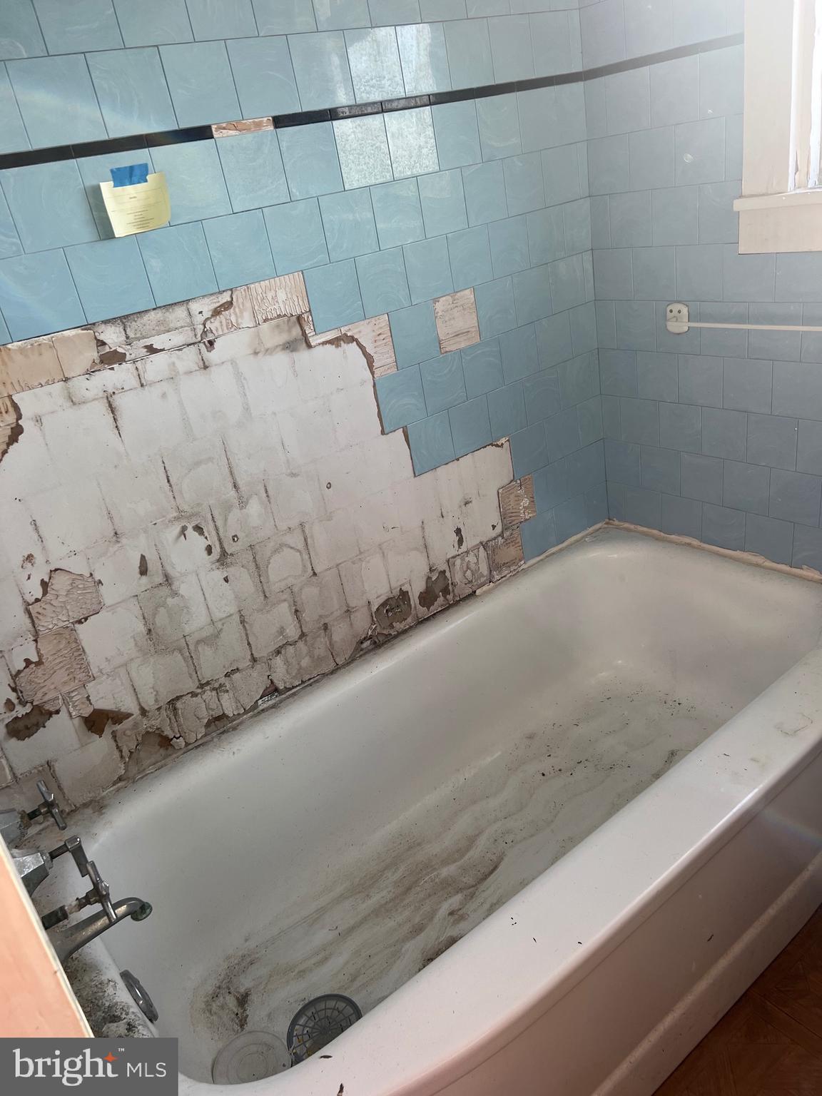 2736 Toddville Road Toddville, MD 21672 - Photo 27 of 44 a bathroom with a bathtub and shower