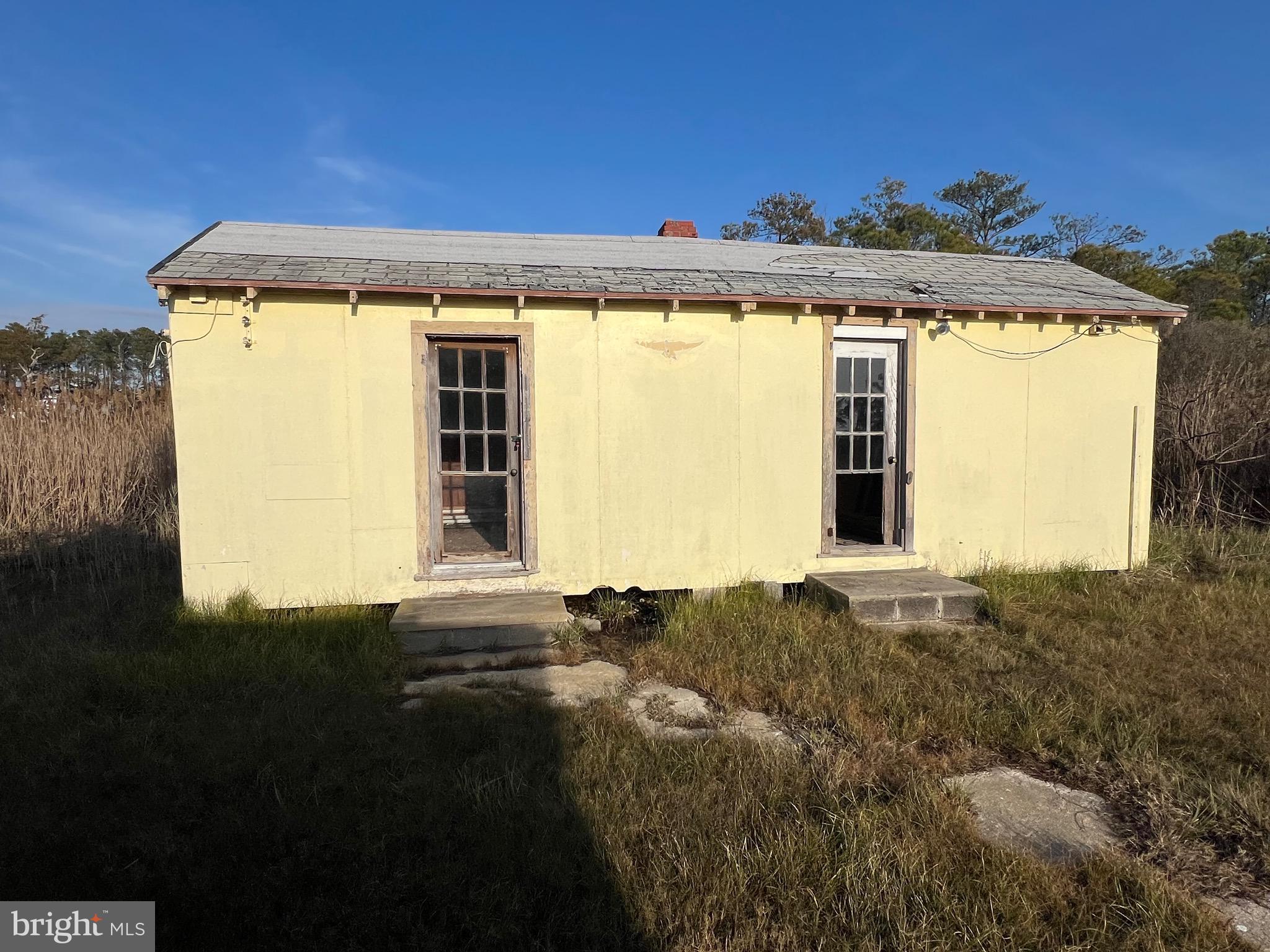 2736 Toddville Road Toddville, MD 21672 - Photo 8 of 44 a view of a big room with a garden