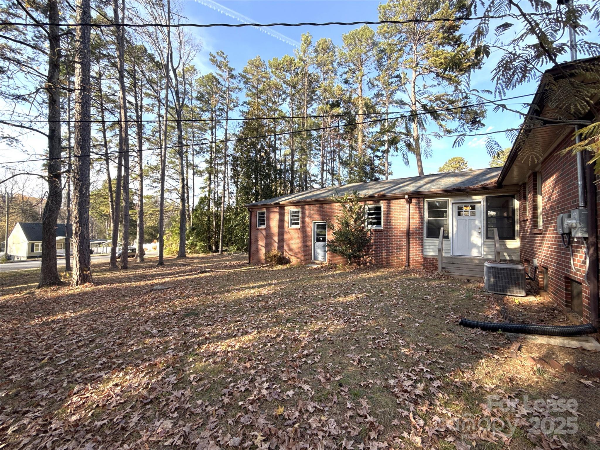 2023 Robin Road Salisbury, NC 28144 - Photo 15 of 17 a view of a house with a tree in the yard